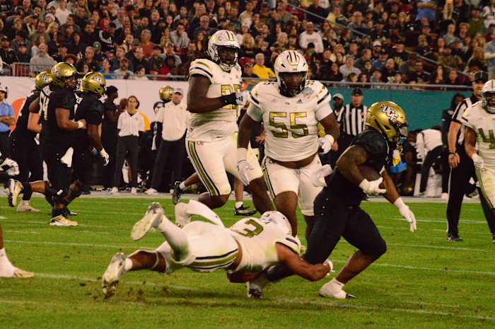 Georgia Tech tackling a UCF running back